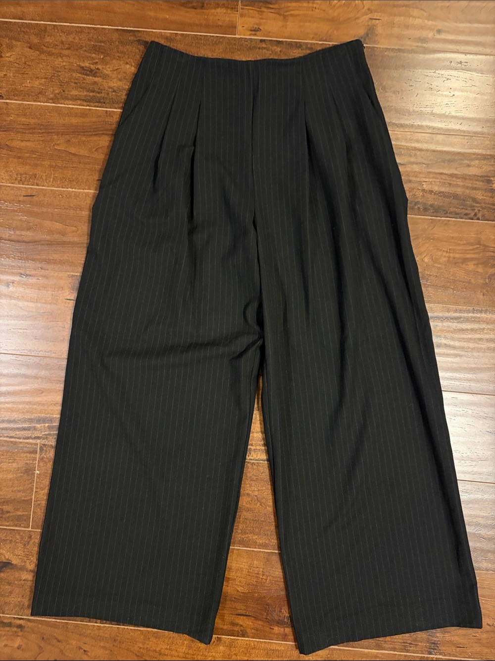 Two-piece wide-leg pantsuit. Signature Charcoal Pinstripe